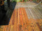 pressure treated deck during cleaning process