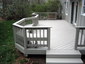 Deck with light grey solid stain applied